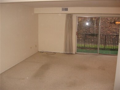Formal living room has plenty of space for all of 