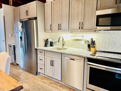 8 Shagbark Rd unit 8, Winhall, VT 05340 - photo 5