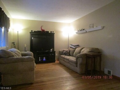 313 Thelma Dr, Sheffield Lake, OH 44054 - photo 2