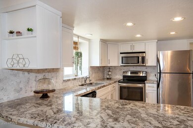 Granite tops and marble backsplash