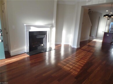 Living Room - Open Floor Plan into Dining Rm & Kitchen