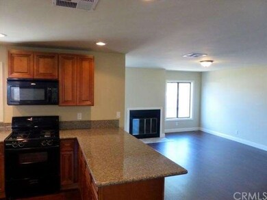 View Of Part Of Kitchen And Family Room