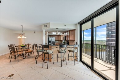 Kitchen featuring light tile patterned floors, sta