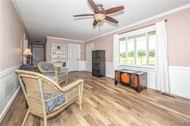 View of family room with large window allowing lot