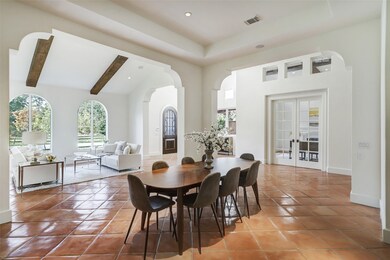 Welcomed by a grand entrance with soaring ceilings