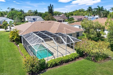 Aerial perspective of suburban area featuring a pool area