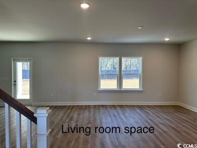 Spare room with hardwood / wood-style flooring