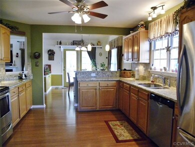 Kitchen with bamboo floor, raised panel cathedral