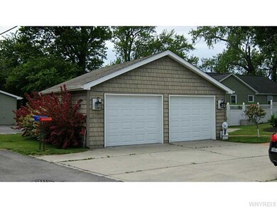 Garage. A large, 2 car garage  with newer roof and
