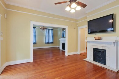 Living into dining room, both with beautiful firep