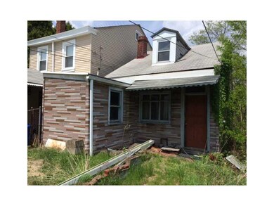Exterior Front. Front of rear home.