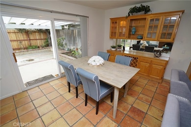 Large Dining with Built In Buffet and a Large Slider