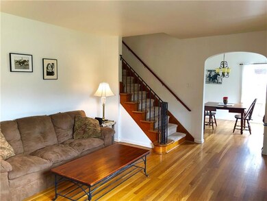 The formal living room opens up the the dining roo