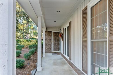 This front porch is ready for your rocking chairs!