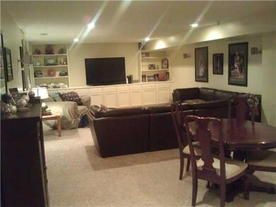 Basement. Every family s dream basement!! Loads of space, custom shelving and cabinets, sports bar and storage room