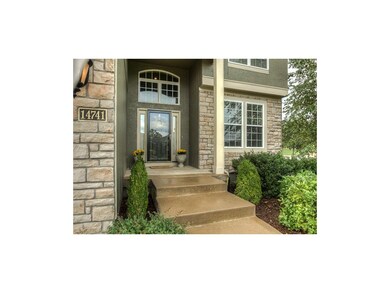 Handsome from the curb with stucco and stone and n