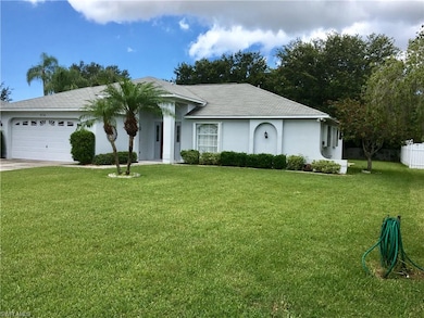 Beautiful double lot.  Baywood Builders most popular ROSEWOOD MODEL. Raised Front Entry. Perimeter motion detector lighting, irrigation, mature landscaping, accordion shutters on all window openings, shade trees in back yard