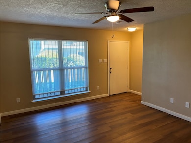 View of front door from living area.
