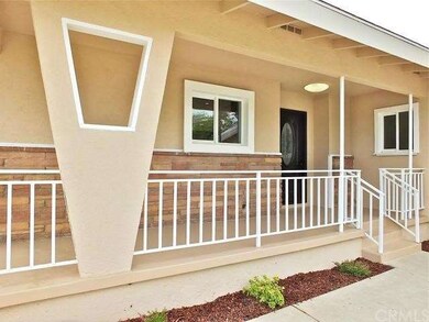 View of the front porch and entryway with angular 