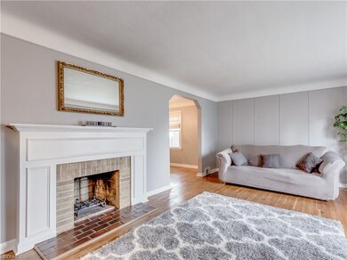 Gas fireplace and entry to the dining room.