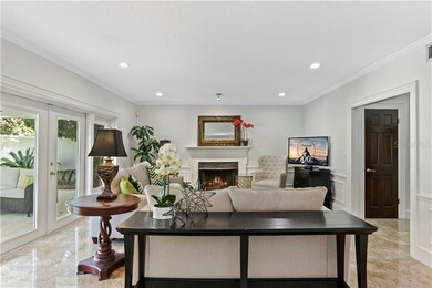Living Room features a wood burning fireplace.
