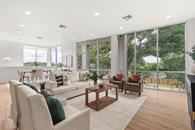 Living area featuring light wood-style floors, re
