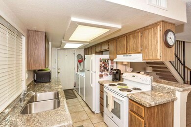 KITCHEN W/GRANITE TOPS