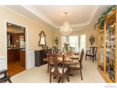 Formal Dining with Tray Ceiling & Lots of Moldings
