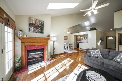 This great room also features a gas fireplace and 