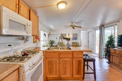Sliding doors lead to screened porch