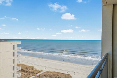 View of water feature with a beach view