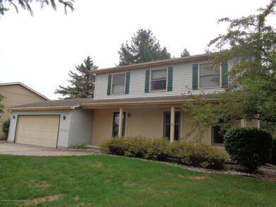 6525 W Millsborough Cir, Lansing, MI 48917 - photo 2