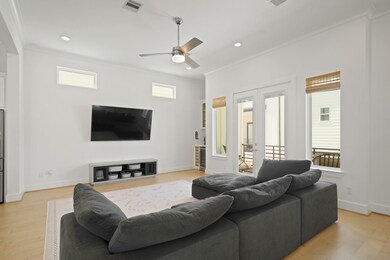 With fixed windows flanking a 6-foot French door l