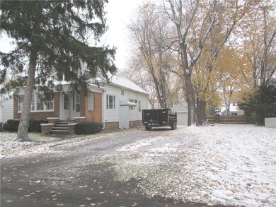 Exterior features a double lot & 2 car garage.