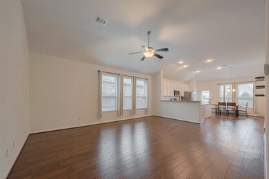 Spanning 16' x 20', this spacious family room is f