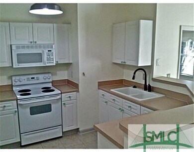 Kitchen. Kitchen with built-in microwave, stove an