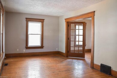 Living leads to dining room.