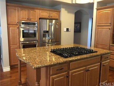 NAT GAS COOK TOP AND GRANITE ISLAND