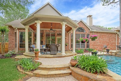 Stately pillars frame this private patio.