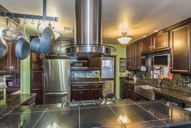 Granite tile c-tops & Stainless appl.