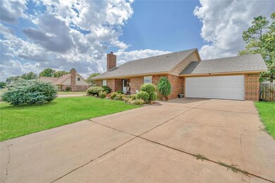 View of front of house featuring a garage and a fr