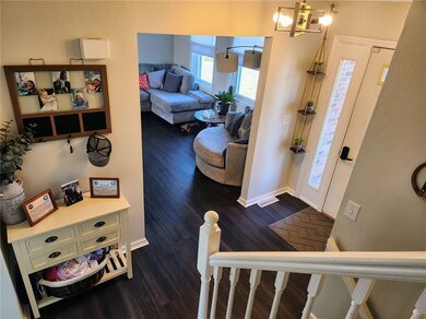 Looking down from upper level into entry, note new