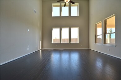 Stunning Grand Living Area with Two Story Walls of Windows!