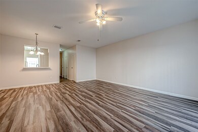 The living room is connected the 8x8 dining room p
