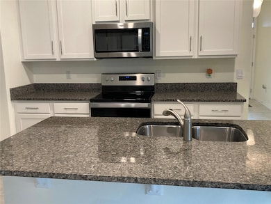View Looking Into Kitchen from Dining Area