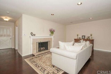 Entry into Formal Living Room with Fireplace.