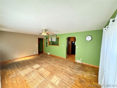 Bedrooms to left of living room