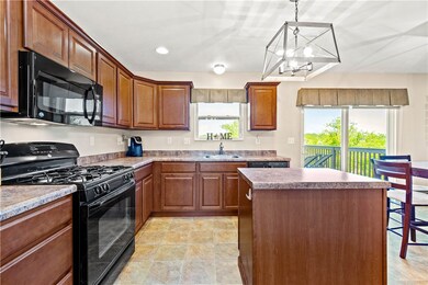Spacious kitchen with gas oven.