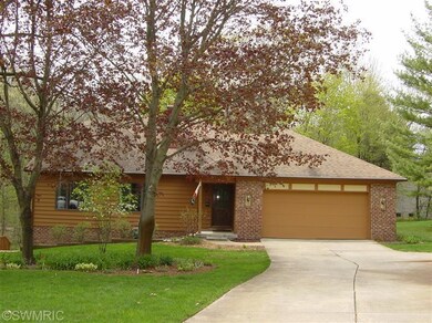 7920 Woodville Dr SE, Alto, MI 49302 - photo 2