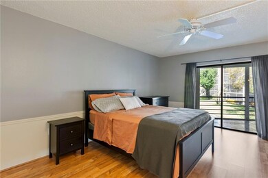 MASTER BEDROOM WITH LAMINATE FLOORING, CHAIR RAILI
